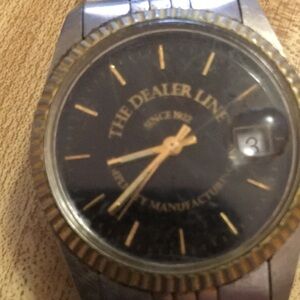 The Dealer Line Gold and Silver Watch